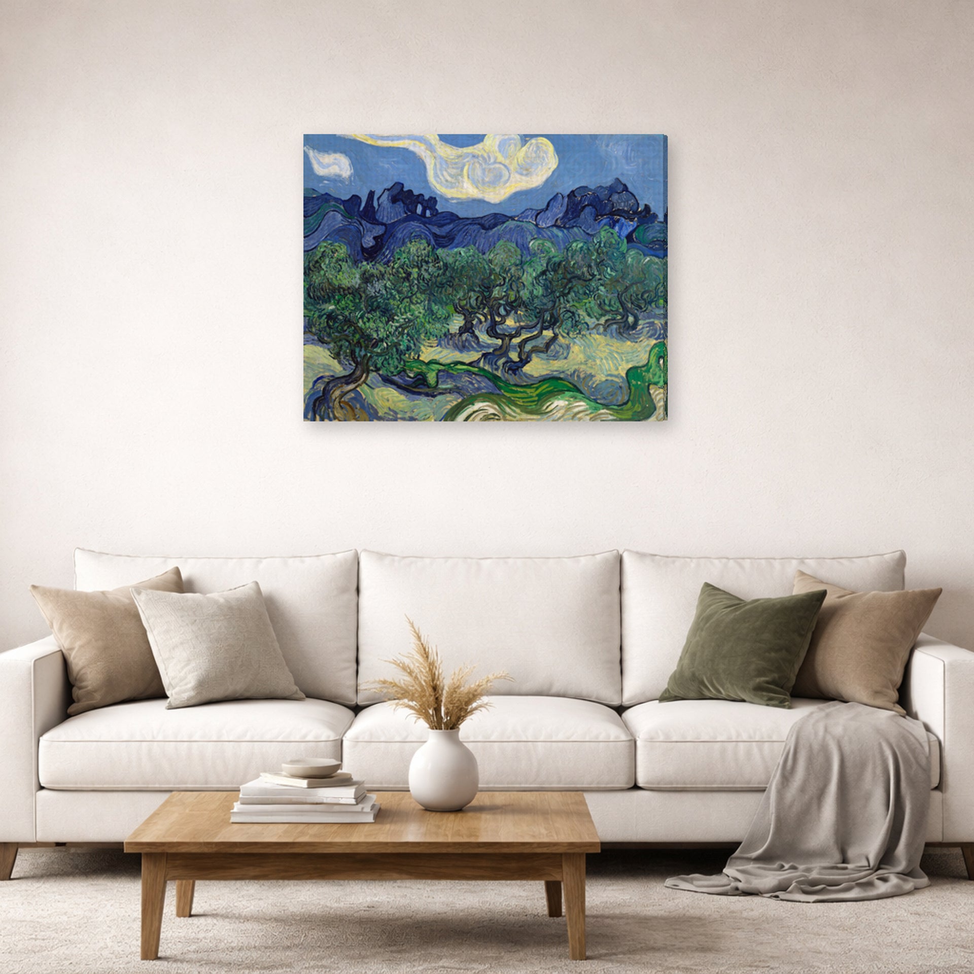 Gallery-wrapped canvas print of Vincent van Gogh's The Olive Trees displayed on a wall in a living room