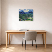 Gallery-wrapped canvas print of Vincent van Gogh's The Olive Trees displayed on a wall in a home office