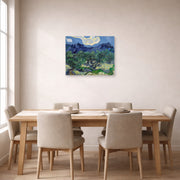 Unframed poster print of Vincent van Gogh's The Olive Trees displayed on a wall in a dining room