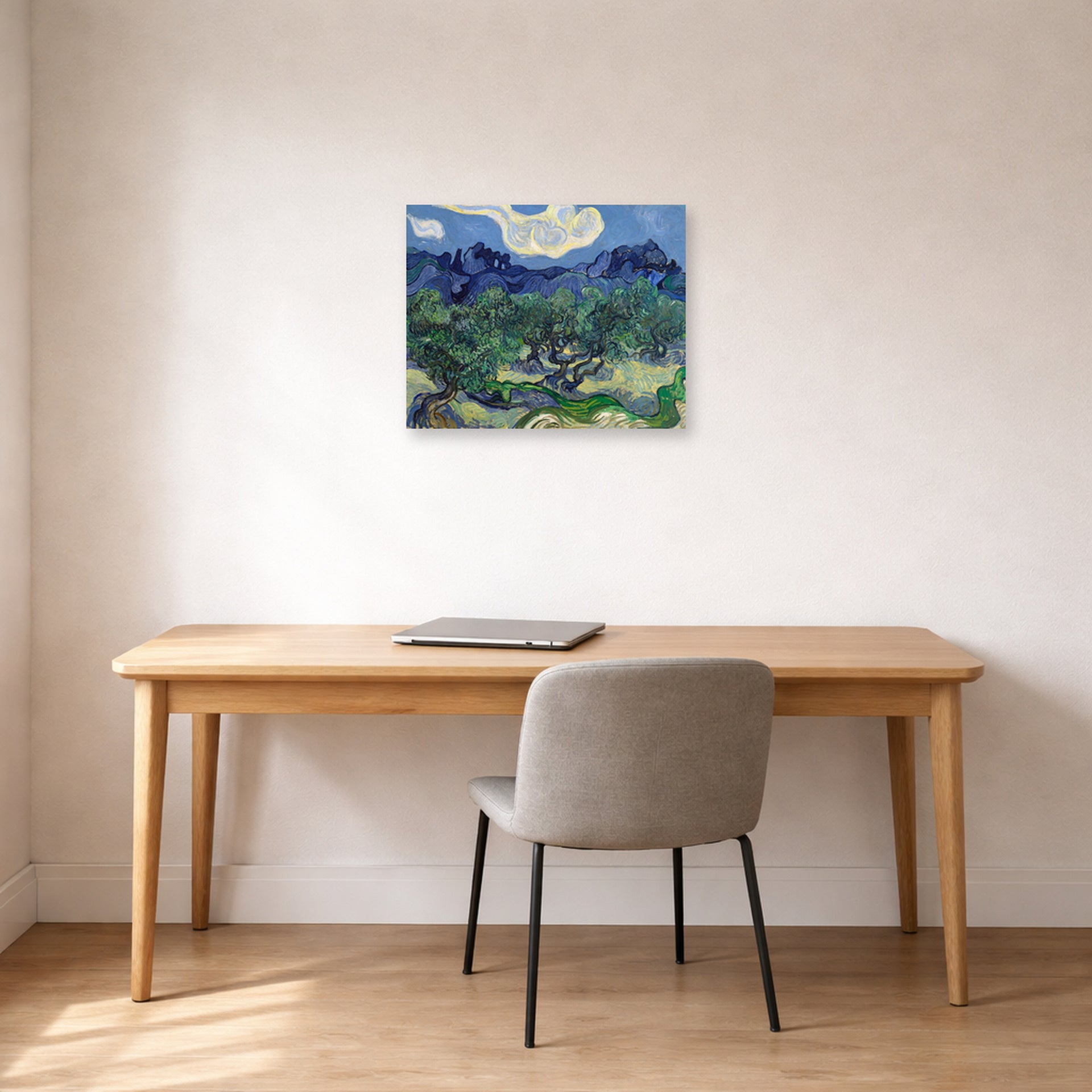 Unframed poster print of Vincent van Gogh's The Olive Trees displayed on a wall in a home office