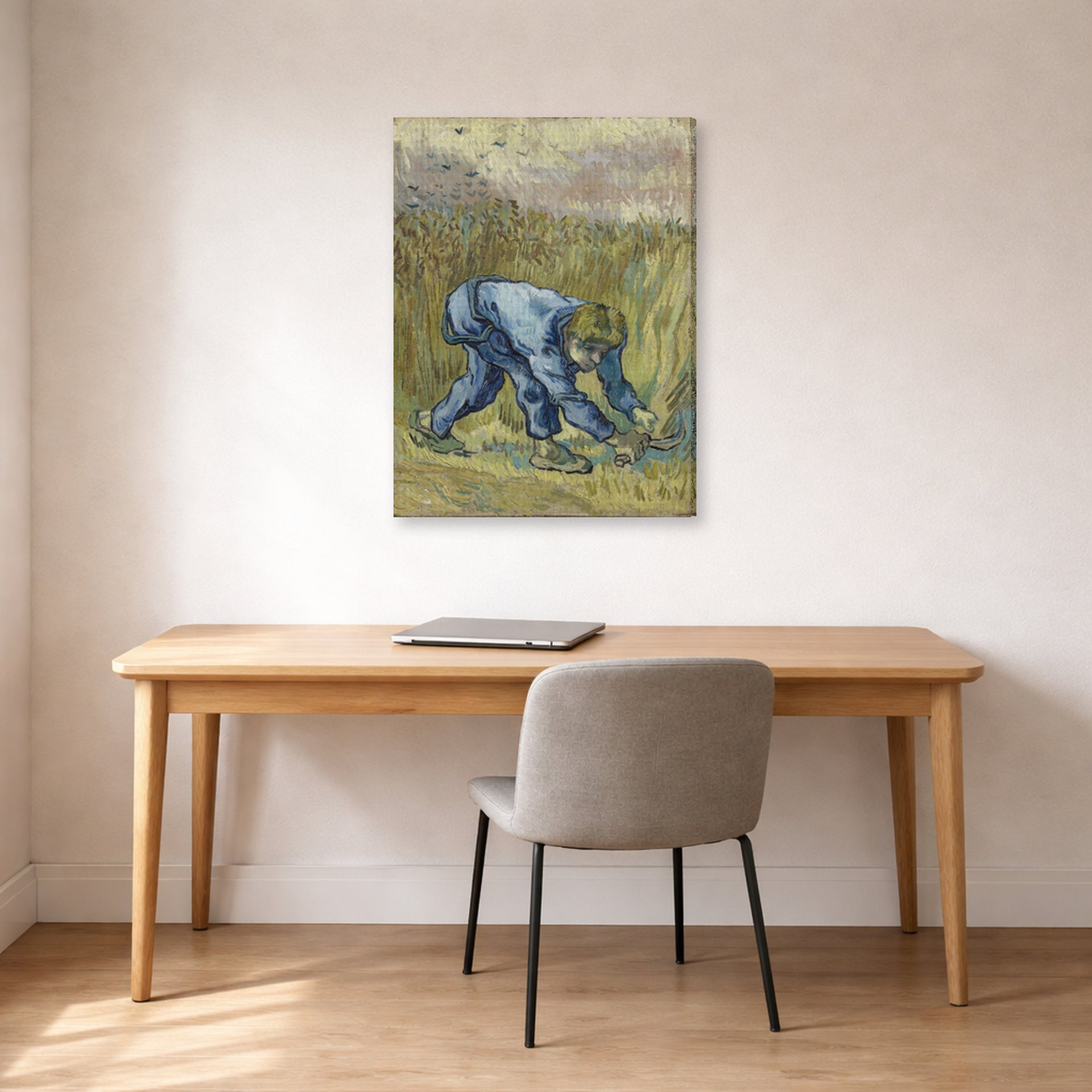Gallery-wrapped canvas print of Vincent van Gogh's The Reaper displayed on a wall in a home office