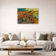 Gallery-wrapped canvas print of Vincent van Gogh's The Red Vineyards at Arles displayed on a wall in a living room