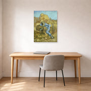 Unframed poster print of Vincent van Gogh's The Sheaf Binder displayed on a wall in a home office