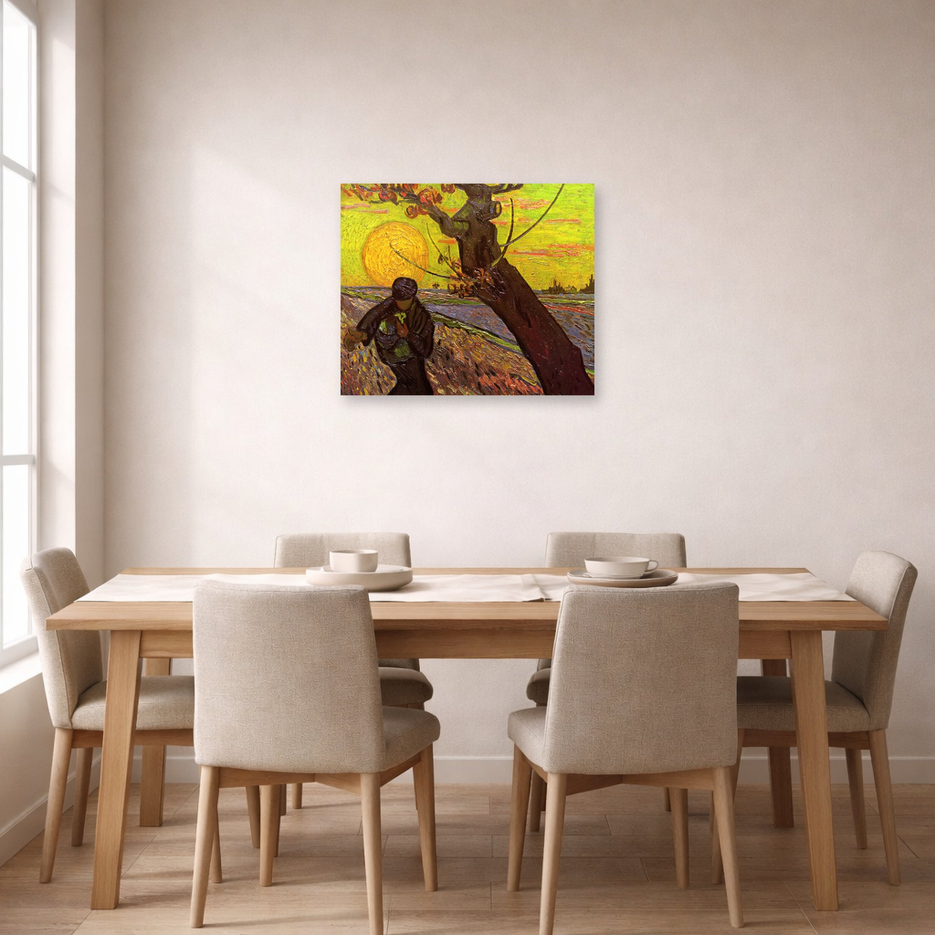 Unframed poster print of Vincent van Gogh's The Sower displayed on a wall in a dining room