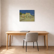 Gallery-wrapped canvas print of Vincent van Gogh's The Yellow House (the Street) displayed on a wall in a home office