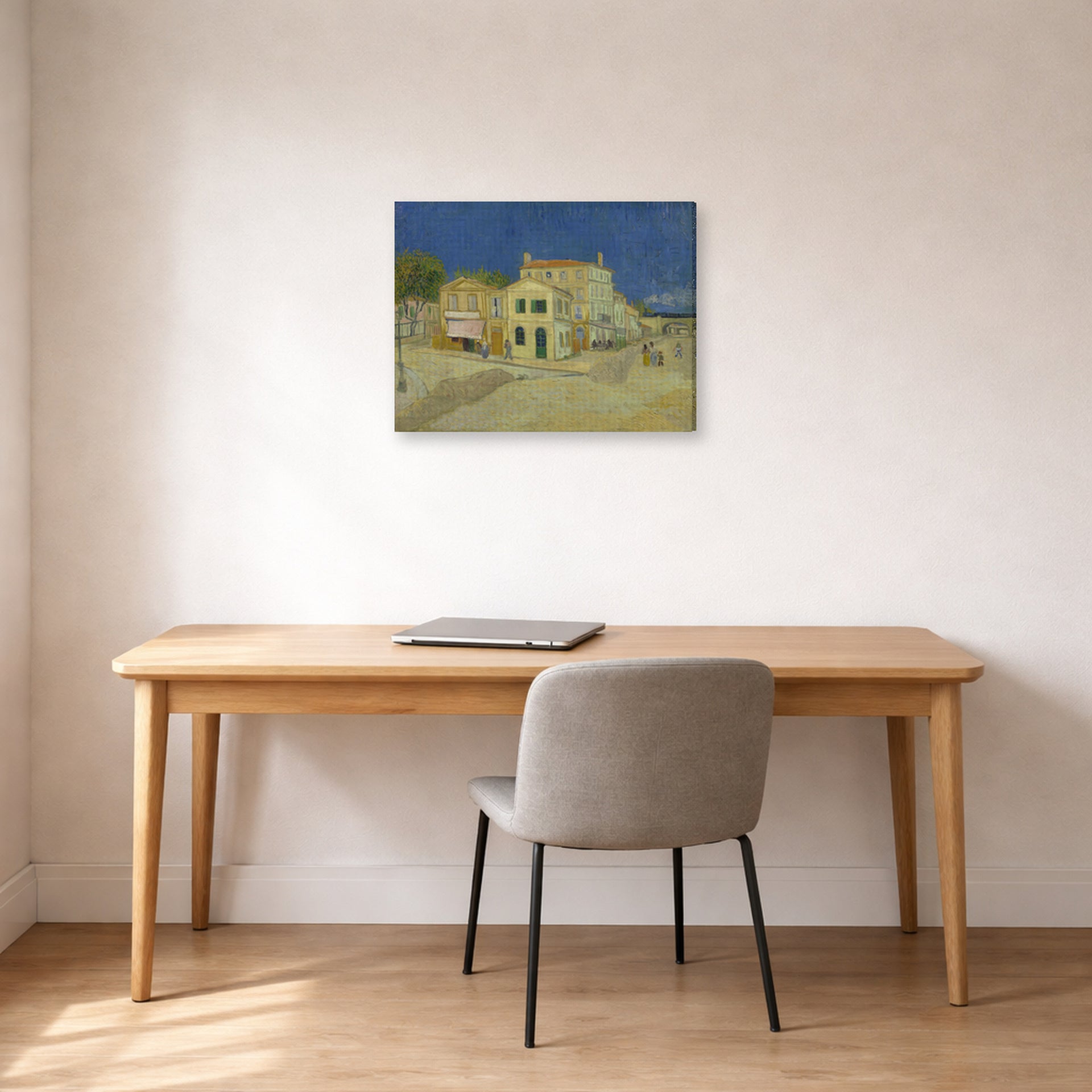 Gallery-wrapped canvas print of Vincent van Gogh's The Yellow House (the Street) displayed on a wall in a home office