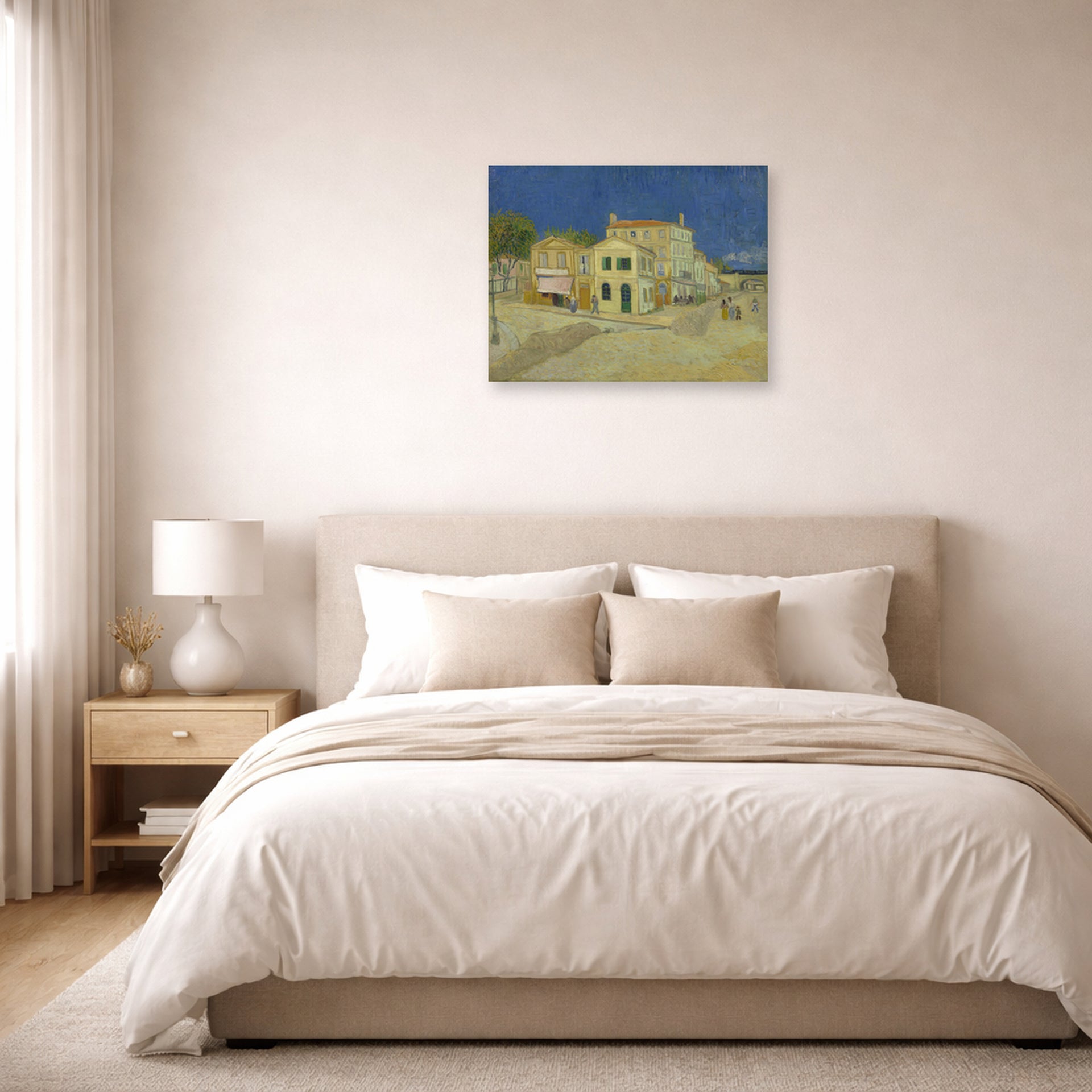 Unframed poster print of Vincent van Gogh's The Yellow House (the Street) displayed on a wall in a bedroom