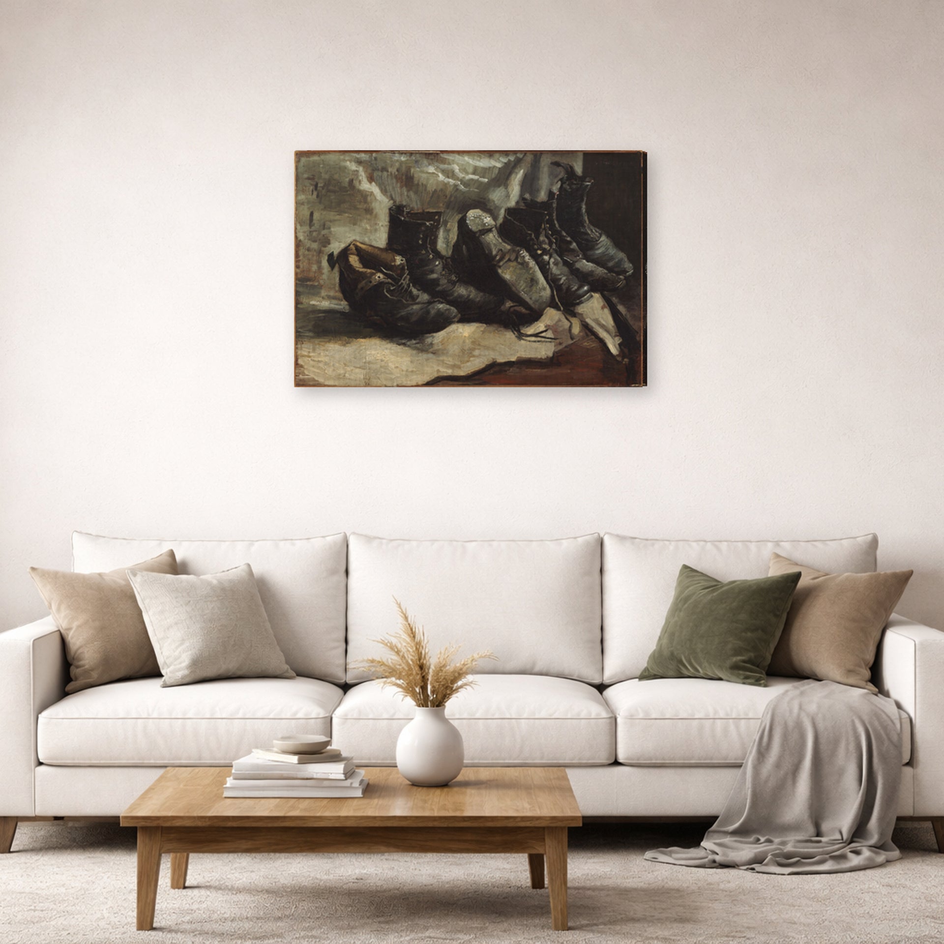 Gallery-wrapped canvas print of Vincent van Gogh's Three Pairs of Shoes displayed on a wall in a living room
