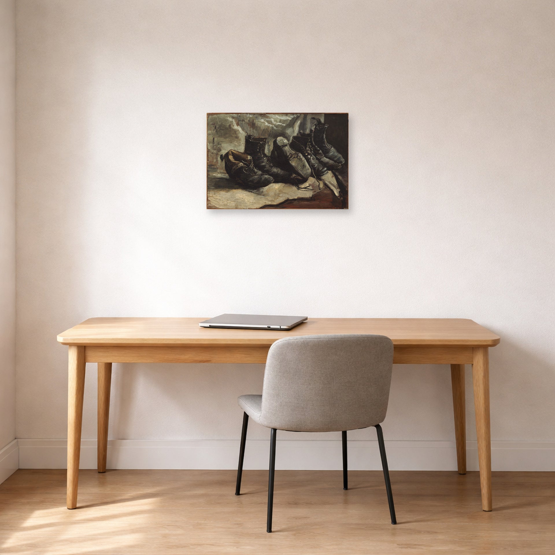 Unframed poster print of Vincent van Gogh's Three Pairs of Shoes displayed on a wall in a home office