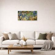 Unframed poster print of Vincent van Gogh's Tree Roots and Trunks displayed on a wall in a living room
