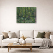Gallery-wrapped canvas print of Vincent van Gogh's Trees and Undergrowth displayed on a wall in a living room