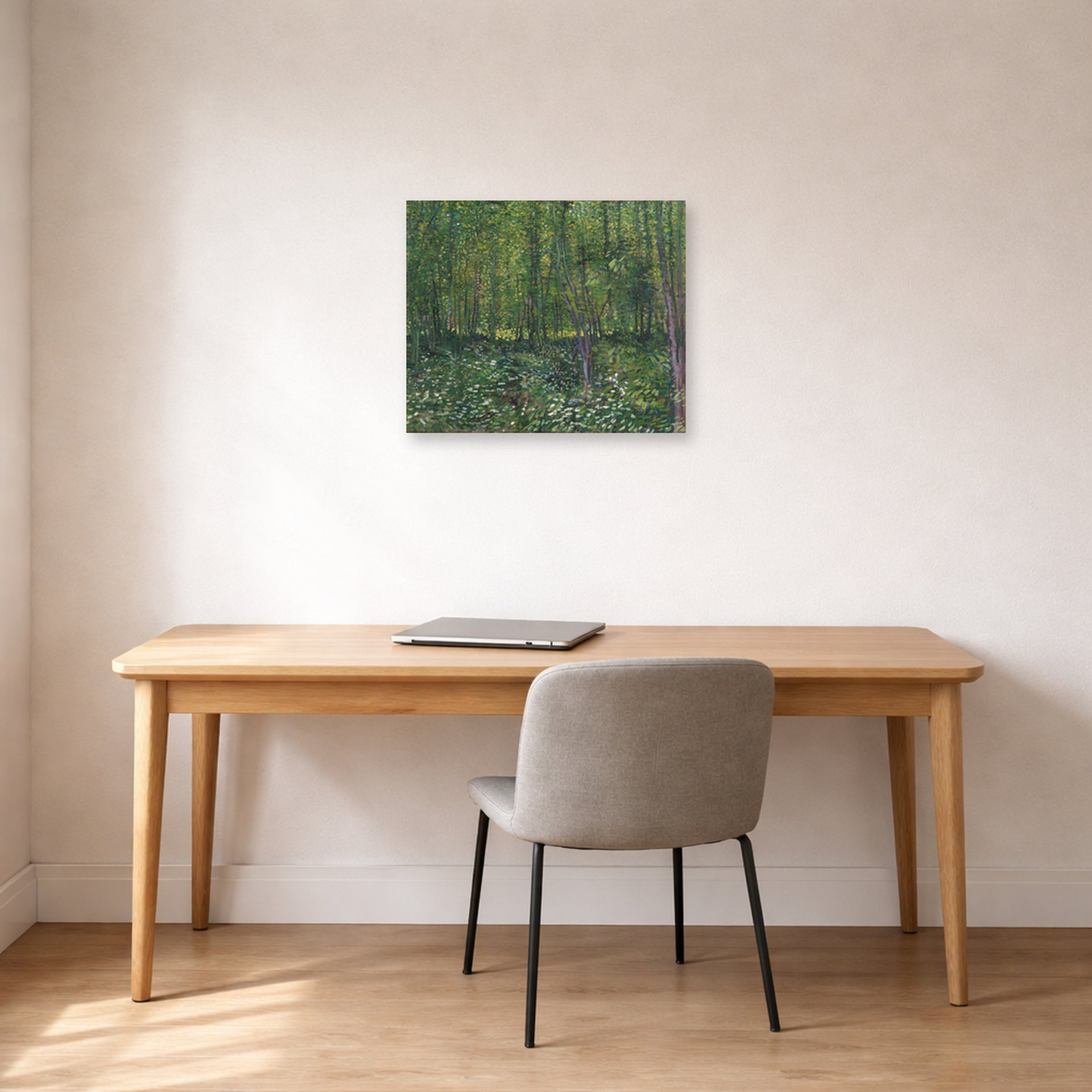 Unframed poster print of Vincent van Gogh's Trees and Undergrowth displayed on a wall in a home office