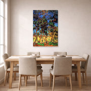 Gallery-wrapped canvas print of Vincent van Gogh's Trees in the Garden of Saint Paul Hospital displayed on a wall in a dining room