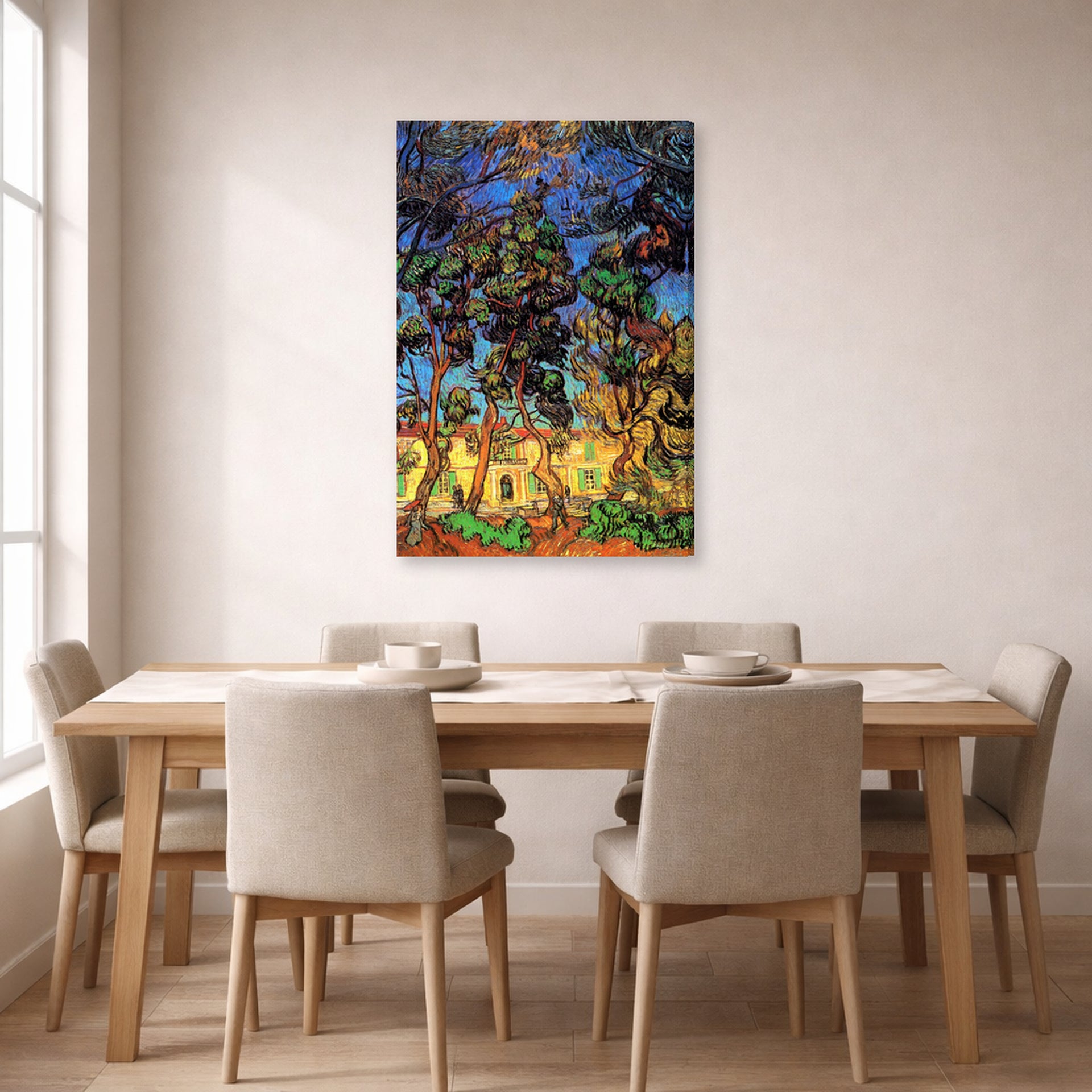 Gallery-wrapped canvas print of Vincent van Gogh's Trees in the Garden of Saint Paul Hospital displayed on a wall in a dining room