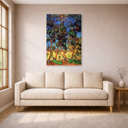 Gallery-wrapped canvas print of Vincent van Gogh's Trees in the Garden of Saint Paul Hospital displayed on a wall in a living room