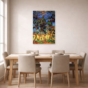 Unframed poster print of Vincent van Gogh's Trees in the Garden of Saint Paul Hospital displayed on a wall in a dining room
