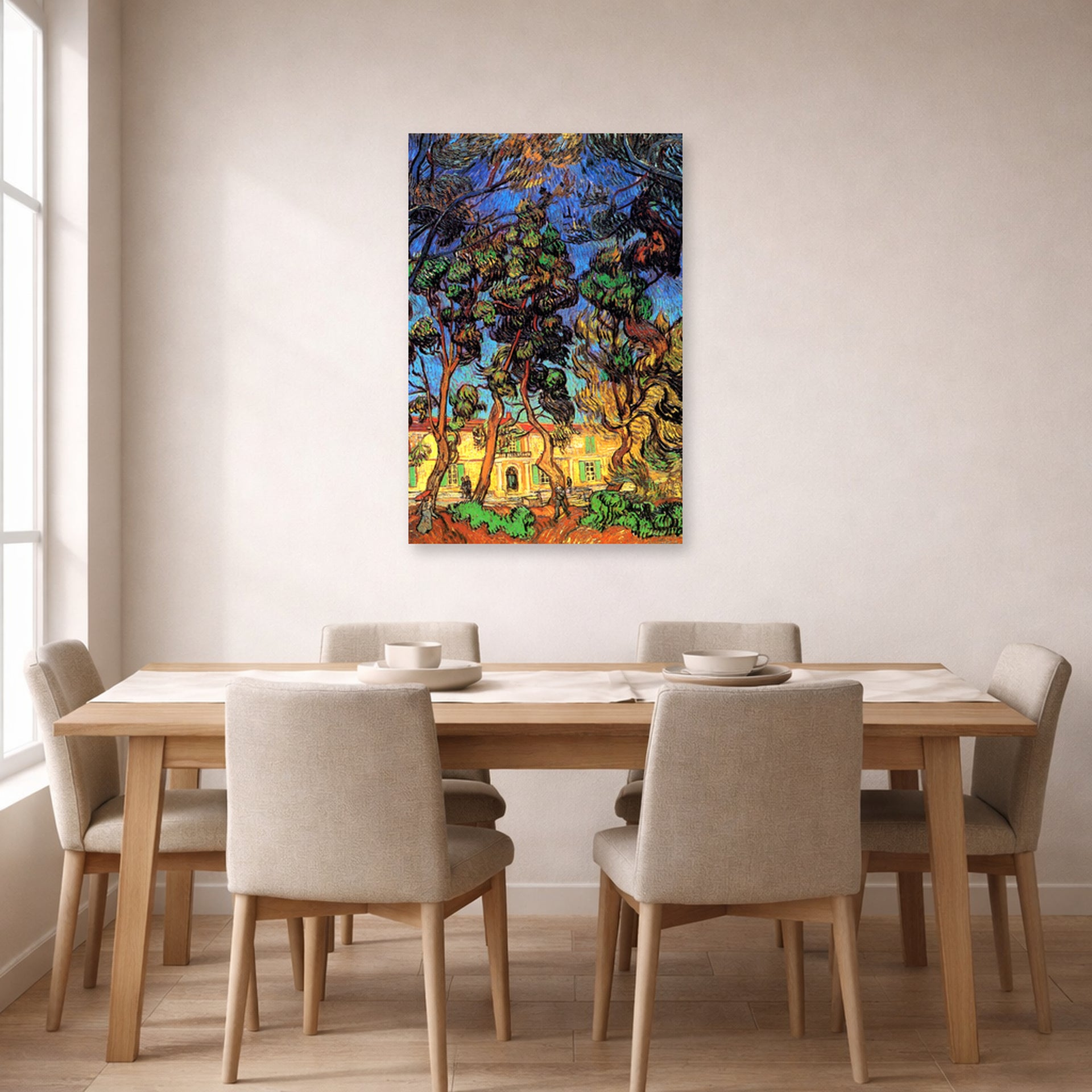 Unframed poster print of Vincent van Gogh's Trees in the Garden of Saint Paul Hospital displayed on a wall in a dining room