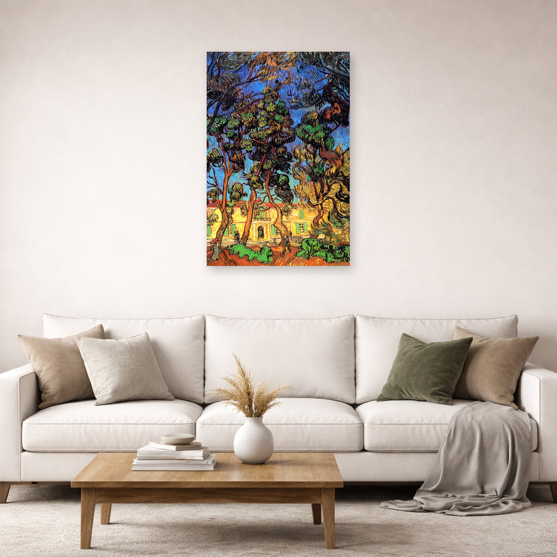 Unframed poster print of Vincent van Gogh's Trees in the Garden of Saint Paul Hospital displayed on a wall in a living room