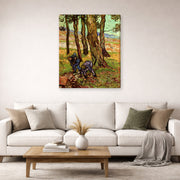 Gallery-wrapped canvas print of Vincent van Gogh's Two Diggers Among Trees displayed on a wall in a living room