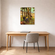 Unframed poster print of Vincent van Gogh's Two Diggers Among Trees displayed on a wall in a home office