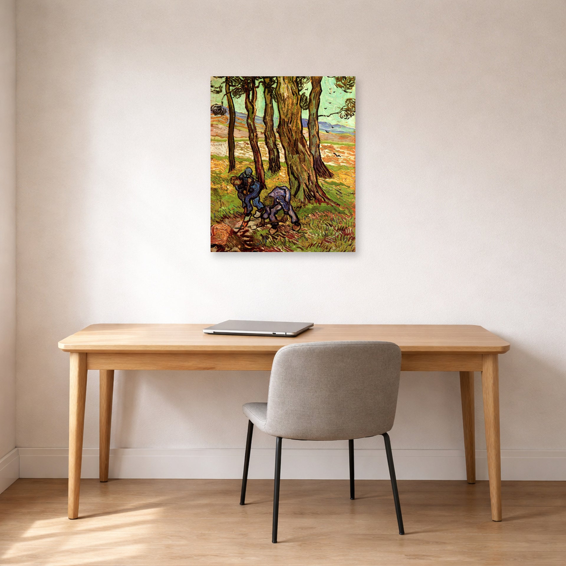 Unframed poster print of Vincent van Gogh's Two Diggers Among Trees displayed on a wall in a home office