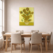 Unframed poster print of Vincent van Gogh's Vase with Fifteen Sunflowers displayed on a wall in a dining room