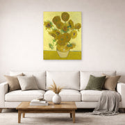 Unframed poster print of Vincent van Gogh's Vase with Fifteen Sunflowers displayed on a wall in a living room