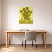 Unframed poster print of Vincent van Gogh's Vase with Fifteen Sunflowers displayed on a wall in a home office