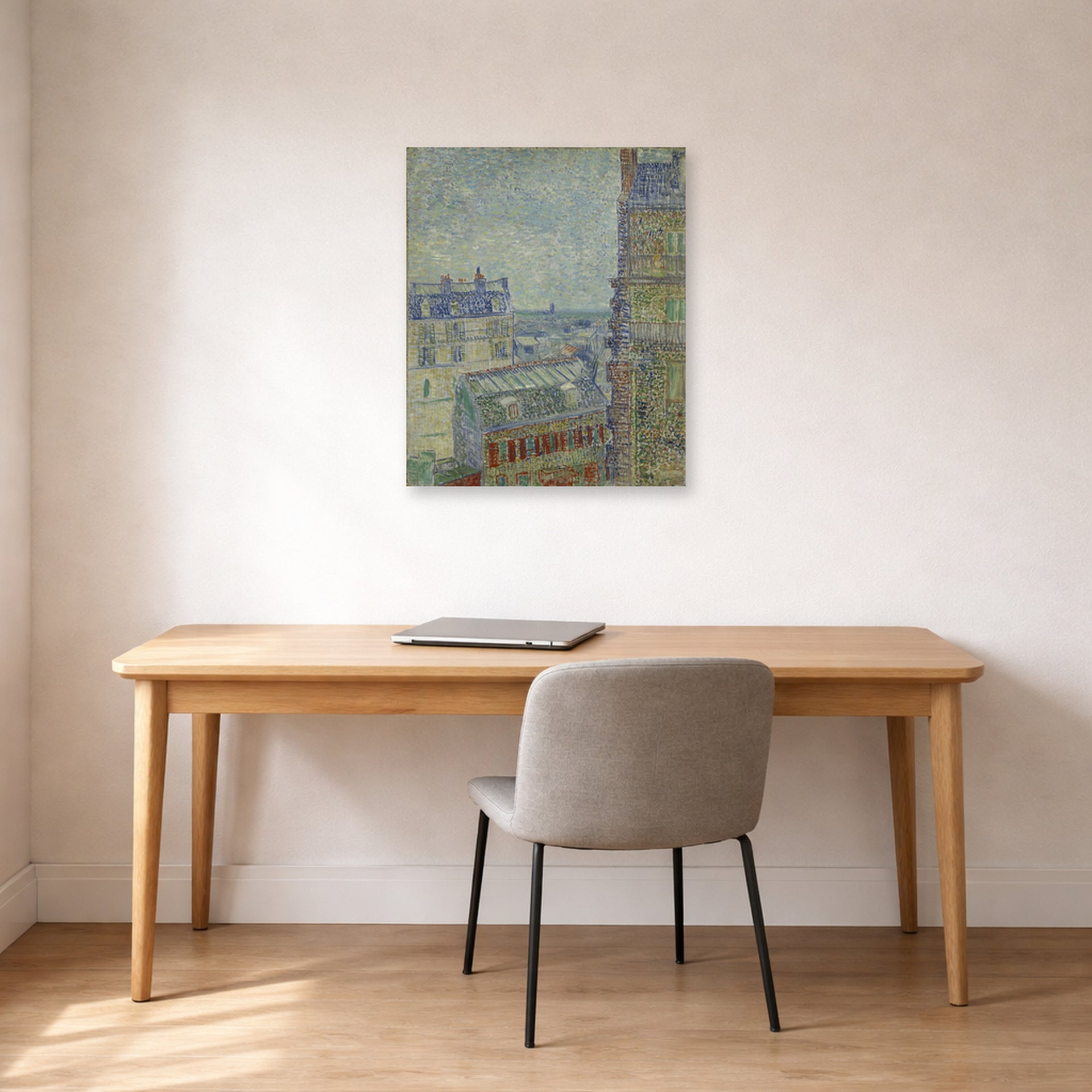 Unframed poster print of Vincent van Gogh's View from Theo's Apartment displayed on a wall in a home office