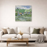 Unframed poster print of Vincent van Gogh's View of Auvers displayed on a wall in a living room