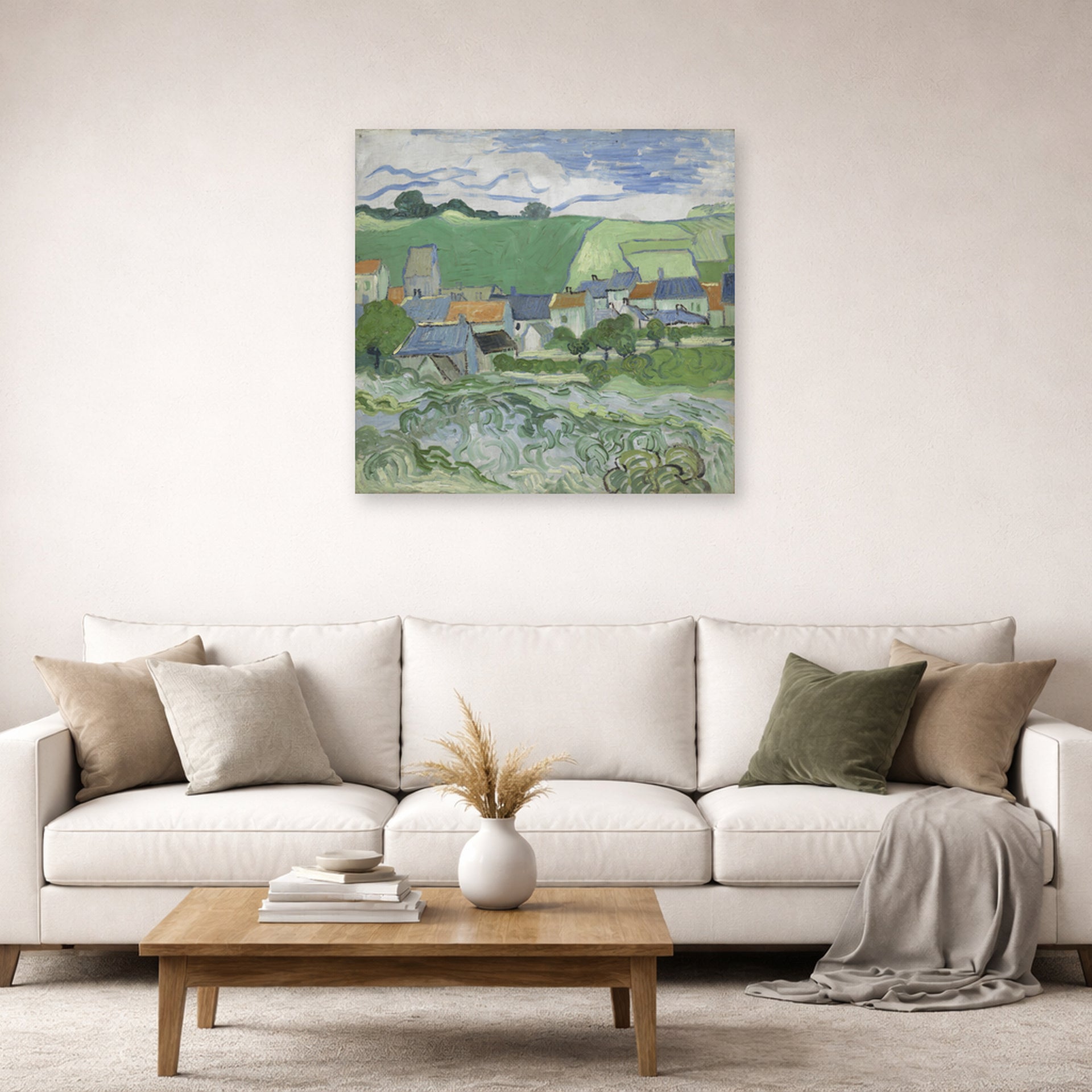 Unframed poster print of Vincent van Gogh's View of Auvers displayed on a wall in a living room