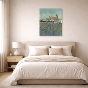 Unframed poster print of Vincent van Gogh's View of Saintes Maries De La Mer displayed on a wall in a bedroom