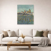 Unframed poster print of Vincent van Gogh's View of Saintes Maries De La Mer displayed on a wall in a living room