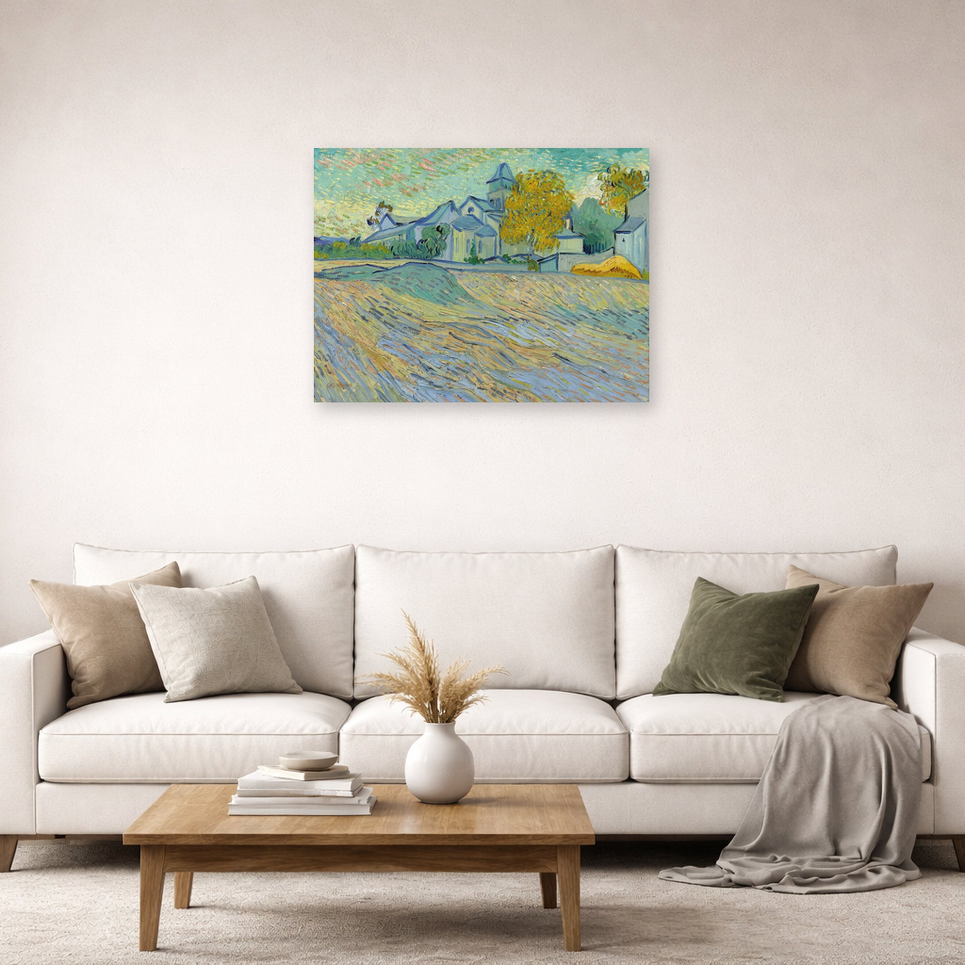 Unframed poster print of Vincent van Gogh's View of the Asylum and Chapel at Saint Remy displayed on a wall in a living room