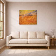 Gallery-wrapped canvas print of Vincent van Gogh's Wheat Fields with Reaper at Sunrise displayed on a wall in a living room