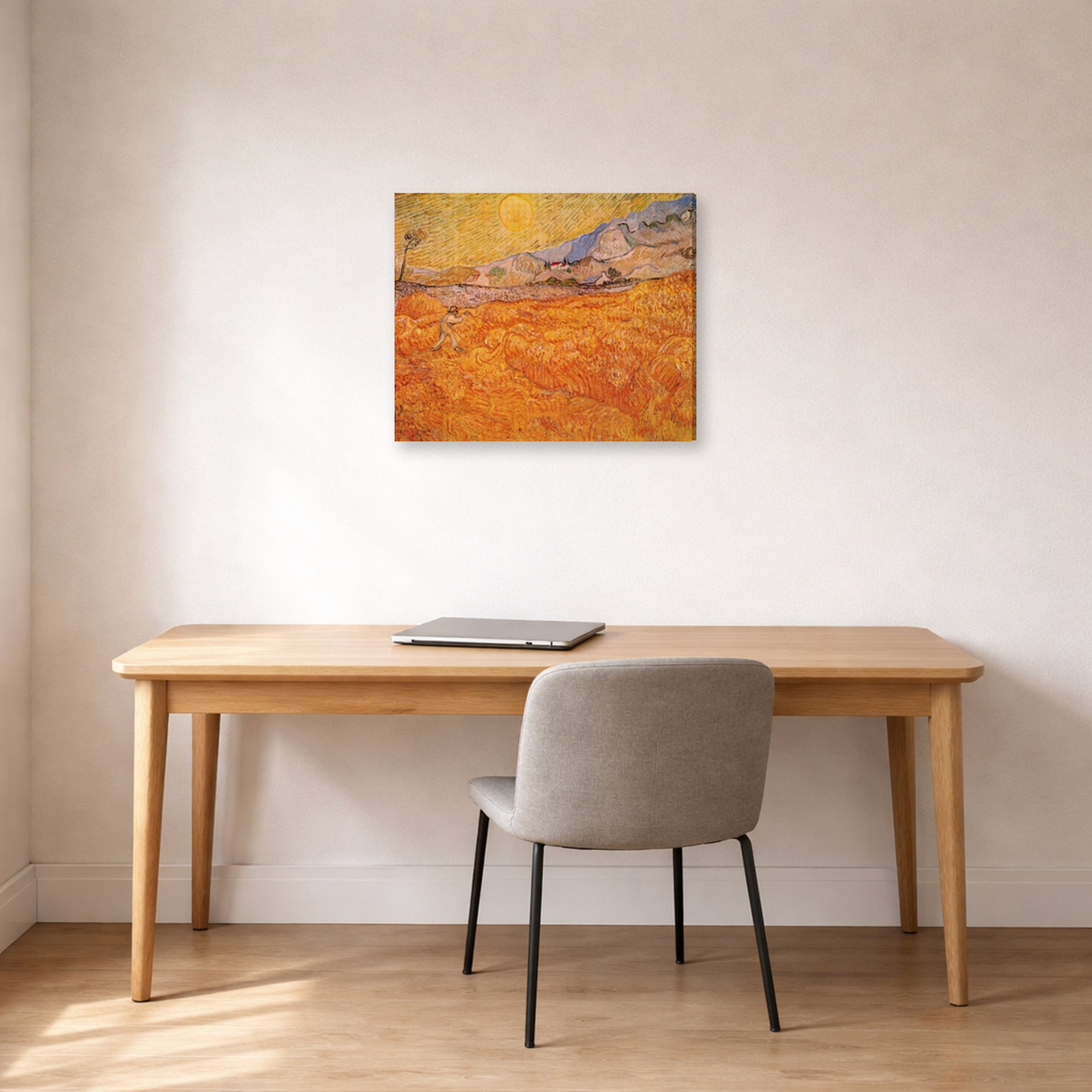 Gallery-wrapped canvas print of Vincent van Gogh's Wheat Fields with Reaper at Sunrise displayed on a wall in a home office