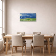 Gallery-wrapped canvas print of Vincent van Gogh's Wheatfield Under Thunderclouds displayed on a wall in a dining room