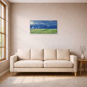 Gallery-wrapped canvas print of Vincent van Gogh's Wheatfield Under Thunderclouds displayed on a wall in a living room