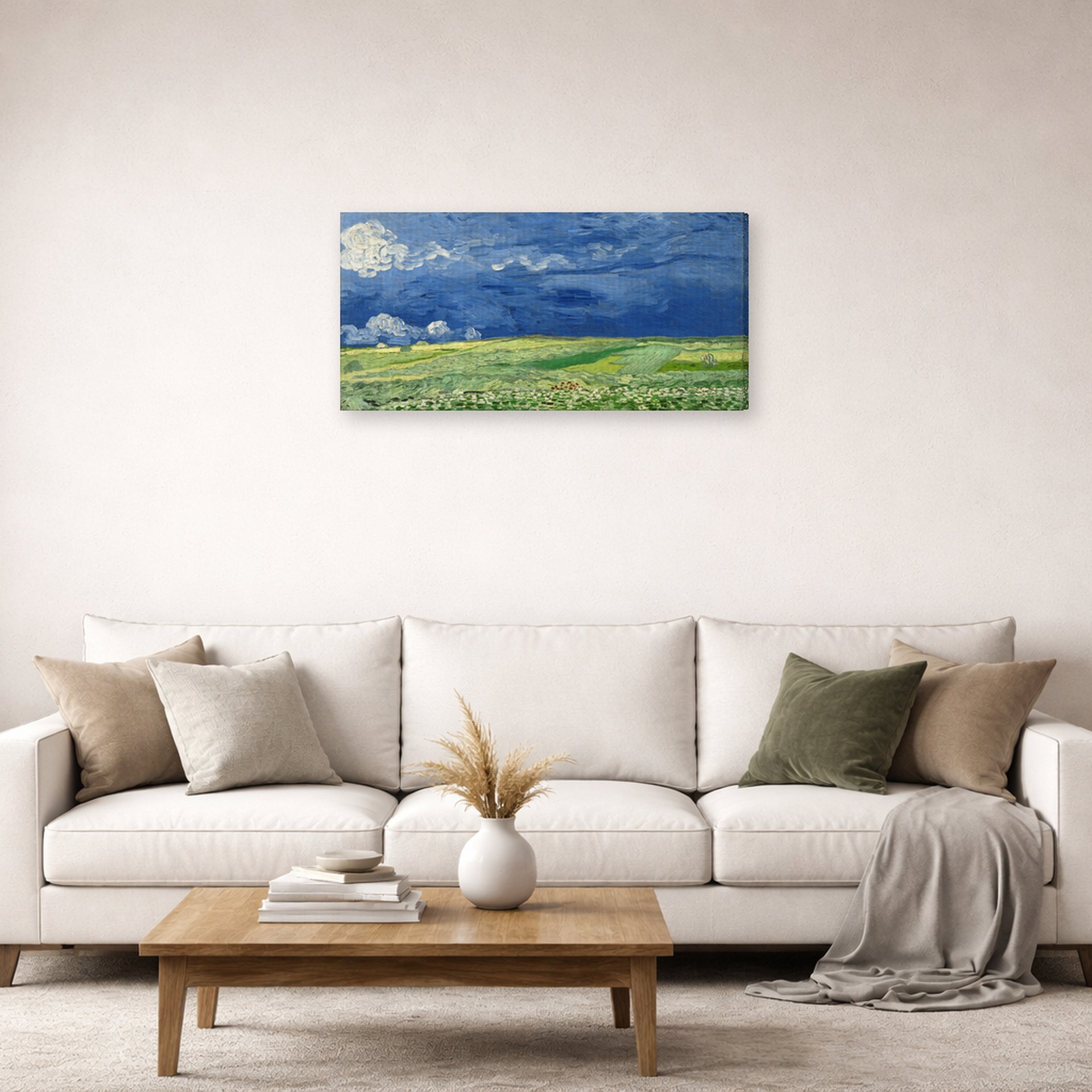 Gallery-wrapped canvas print of Vincent van Gogh's Wheatfield Under Thunderclouds displayed on a wall in a living room