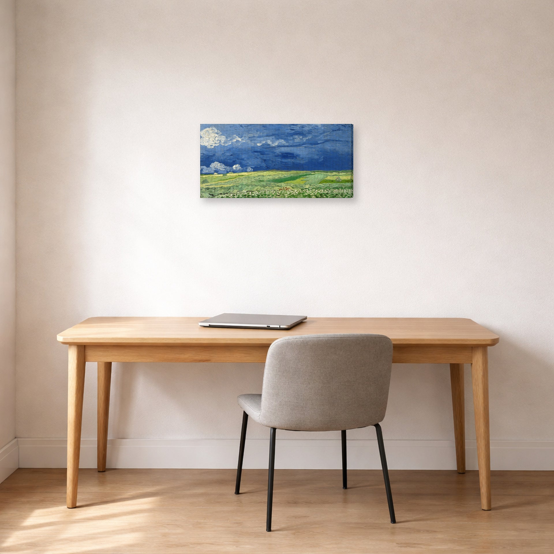 Gallery-wrapped canvas print of Vincent van Gogh's Wheatfield Under Thunderclouds displayed on a wall in a home office