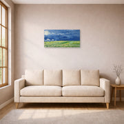 Unframed poster print of Vincent van Gogh's Wheatfield Under Thunderclouds displayed on a wall in a living room