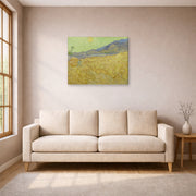 Gallery-wrapped canvas print of Vincent van Gogh's Wheatfield with a Reaper displayed on a wall in a living room