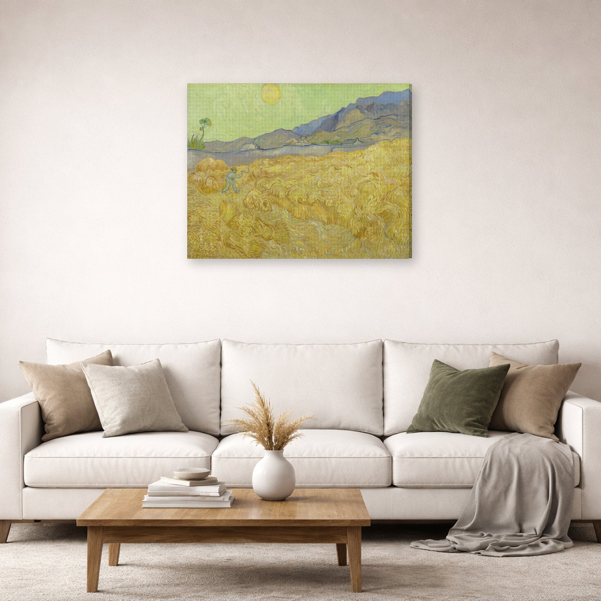 Gallery-wrapped canvas print of Vincent van Gogh's Wheatfield with a Reaper displayed on a wall in a living room