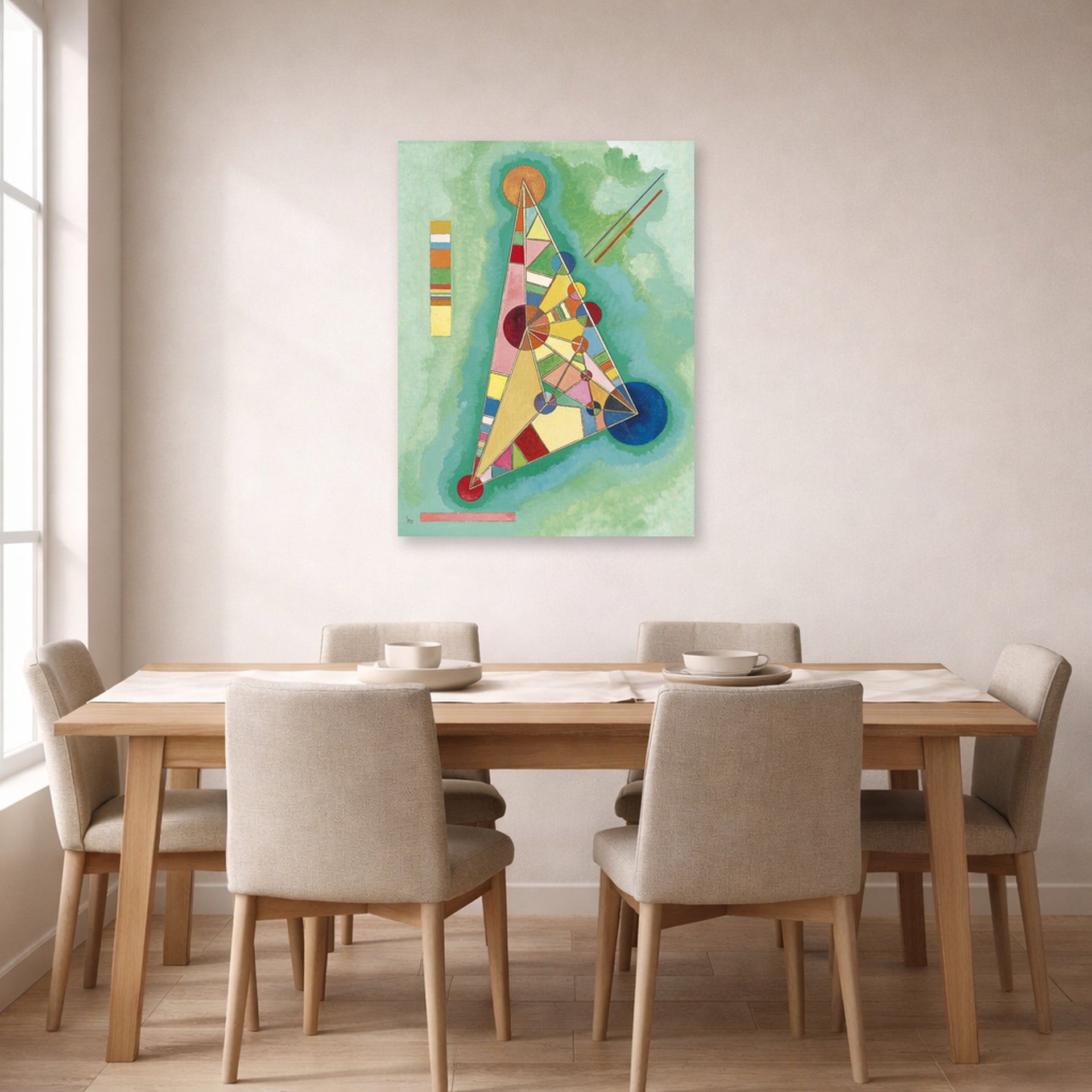 Unframed poster print of Wassily Kandinsky's Bunt Im Dreieck (Bigarrure Dans Le Triangle) displayed on a wall in a dining room