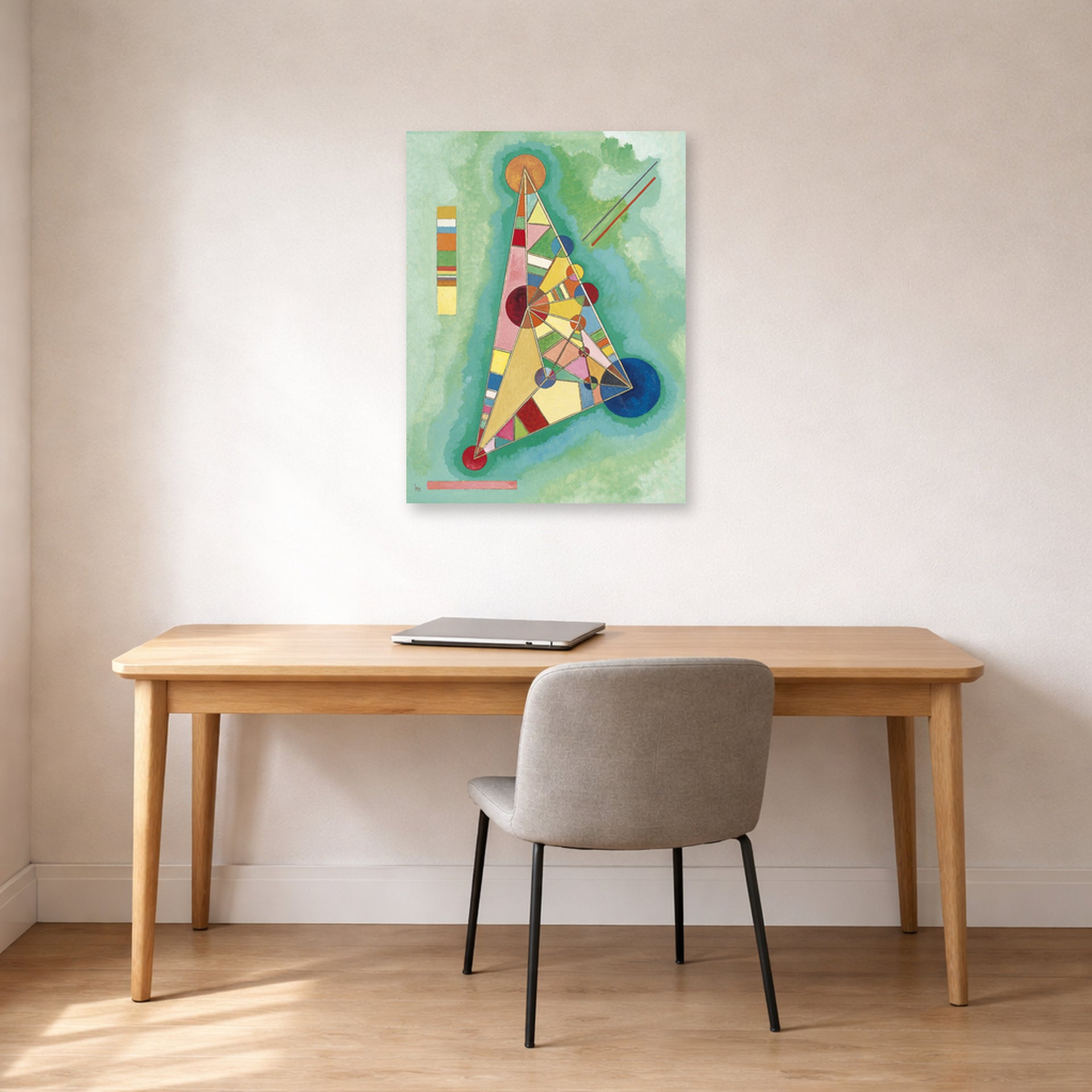 Unframed poster print of Wassily Kandinsky's Bunt Im Dreieck (Bigarrure Dans Le Triangle) displayed on a wall in an office