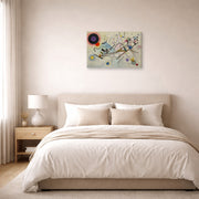 Gallery-wrapped canvas print of Wassily Kandinsky's Composition VIII displayed on a wall in a bedroom
