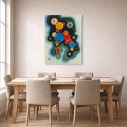 Gallery-wrapped canvas print of Wassily Kandinsky's Deepened Impulse displayed on a wall in a dining room