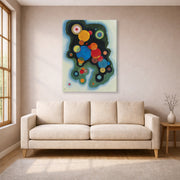 Gallery-wrapped canvas print of Wassily Kandinsky's Deepened Impulse displayed on a wall in a living room