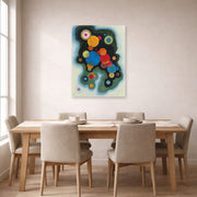 Unframed poster print of Wassily Kandinsky's Deepened Impulse displayed on a wall in a dining room