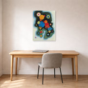 Unframed poster print of Wassily Kandinsky's Deepened Impulse displayed on a wall in an office